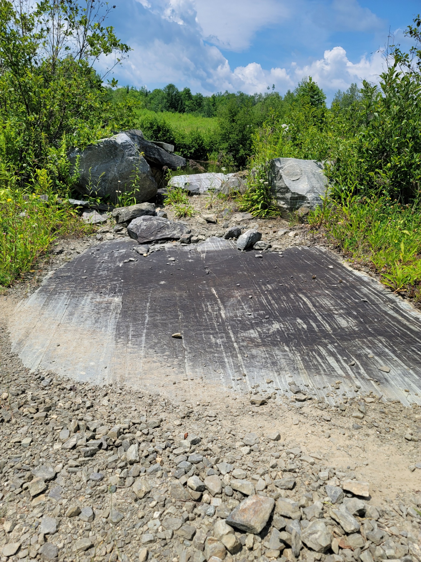Polished quarry floor showing exposed bedrock